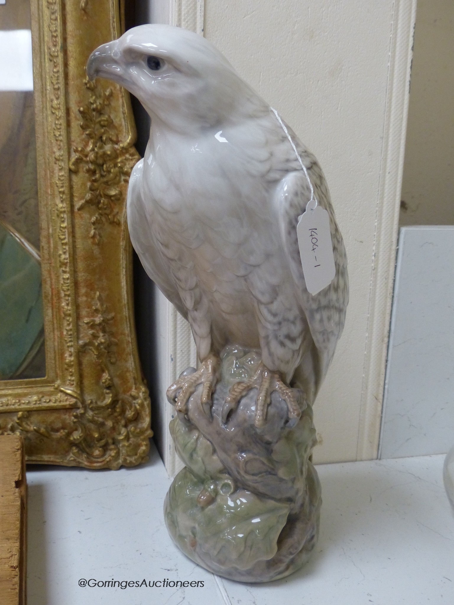 A Royal Copenhagen figure of an Icelandic Gyr falcon, model number 1661, 40 cm high